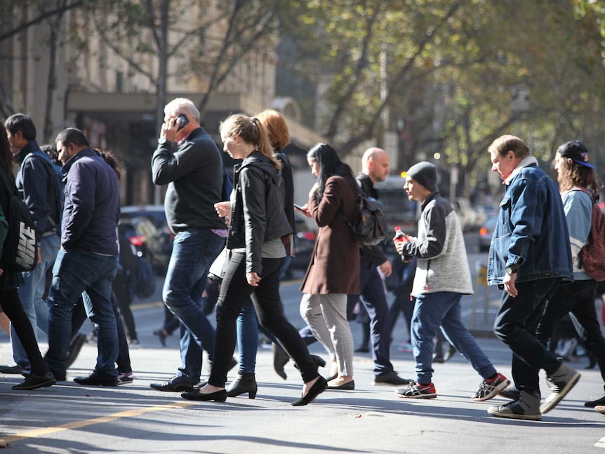 People are crossing a street.